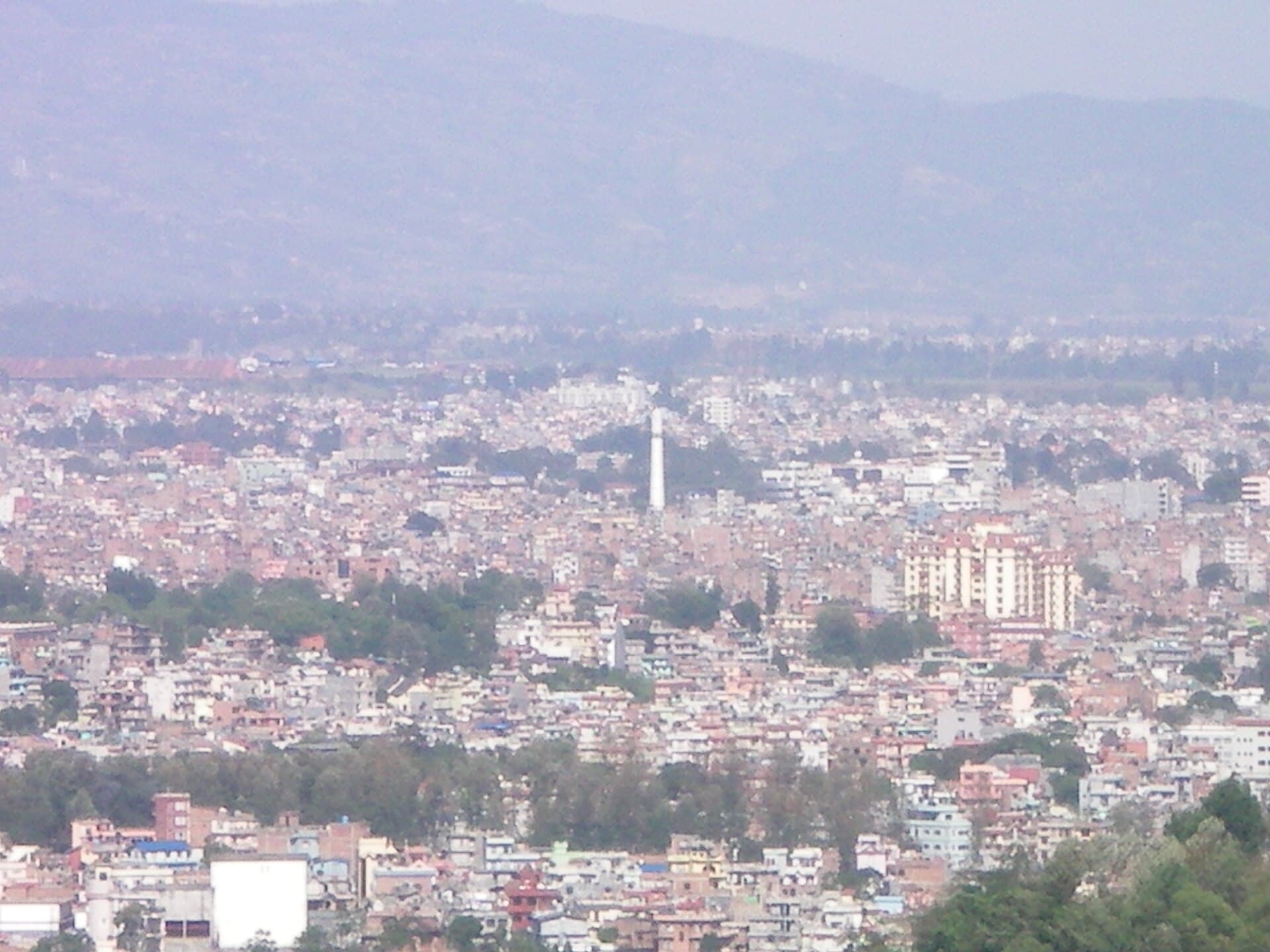 Dharahara(Bhimsen Tower) and scene of Kathmandu - panoramio.jpg